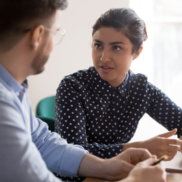 Two professionals having a discussion